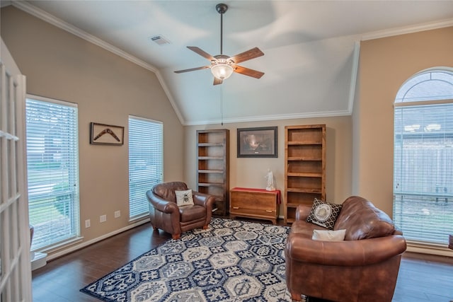 living area featuring visible vents, wood finished floors, crown molding, lofted ceiling, and ceiling fan