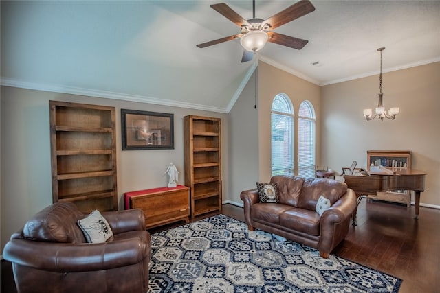 living area with ceiling fan with notable chandelier, wood finished floors, crown molding, baseboards, and vaulted ceiling