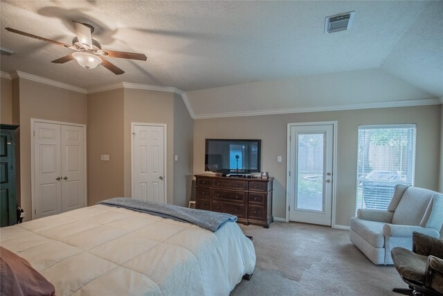 bedroom featuring access to exterior, visible vents, light colored carpet, lofted ceiling, and ornamental molding