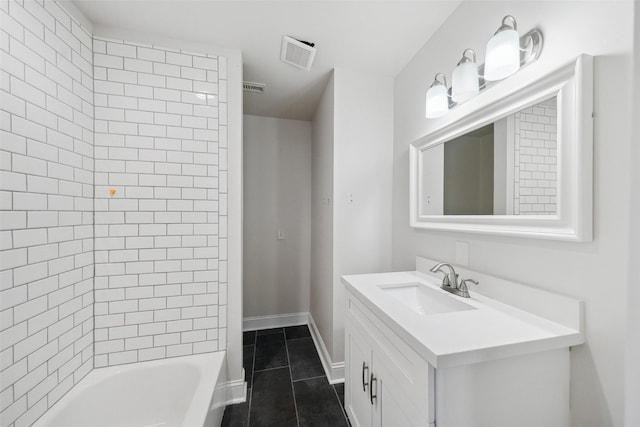 bathroom featuring tile patterned floors, visible vents, tub / shower combination, and vanity