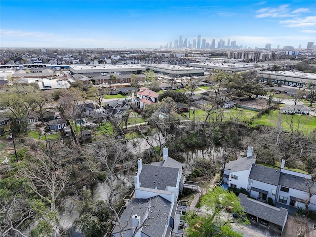 drone / aerial view featuring a city view