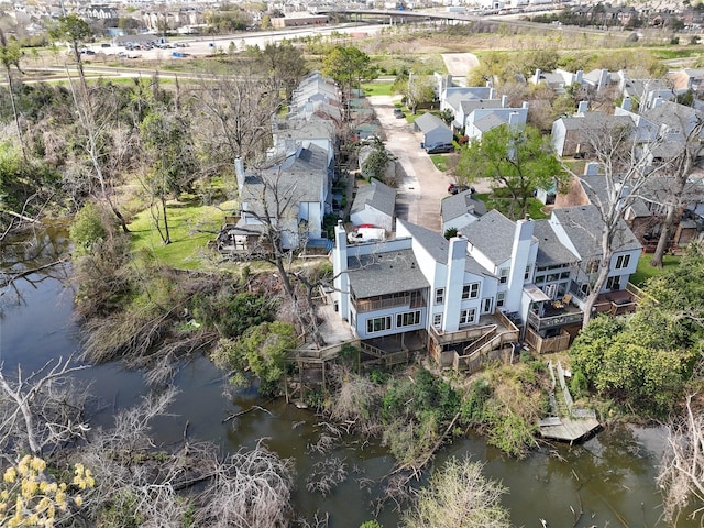 aerial view featuring a residential view and a water view