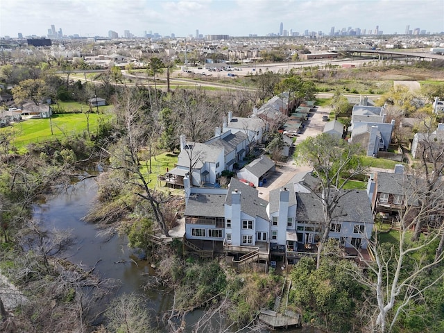 birds eye view of property featuring a view of city