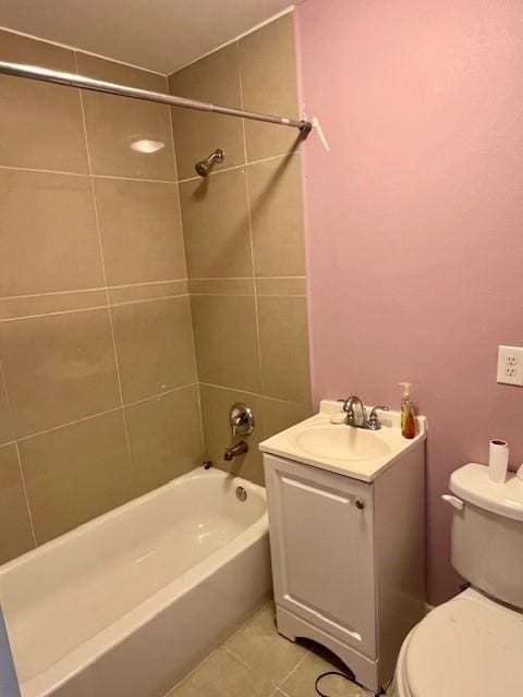 full bathroom featuring vanity, shower / bath combination, tile patterned flooring, and toilet