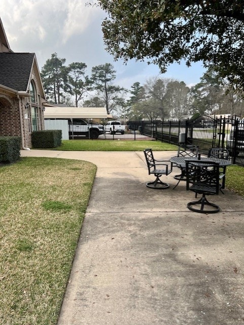 surrounding community with a yard and fence