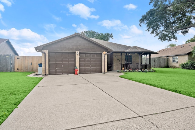 ranch-style house with a garage, brick siding, fence, and a front lawn