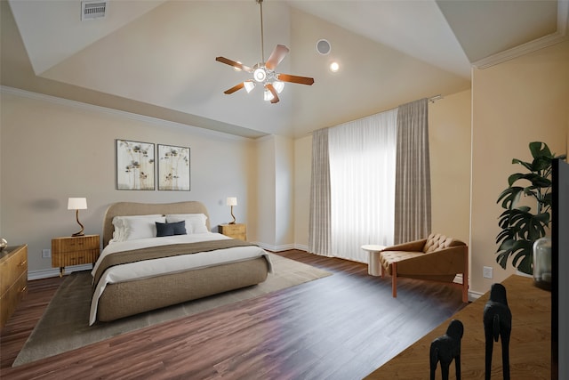 bedroom with high vaulted ceiling, visible vents, crown molding, and wood finished floors