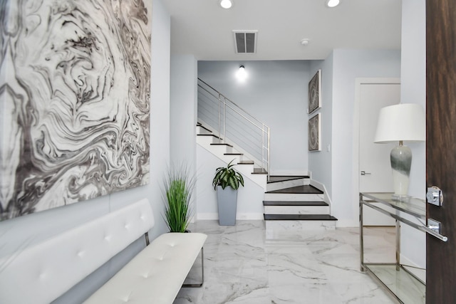 interior space featuring stairway, recessed lighting, visible vents, and marble finish floor