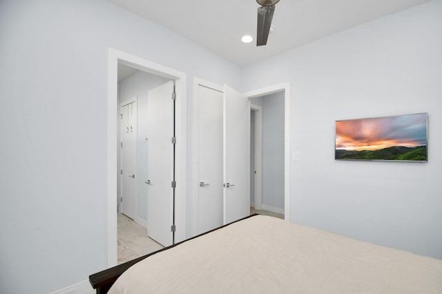 unfurnished bedroom with recessed lighting, a ceiling fan, marble finish floor, and baseboards