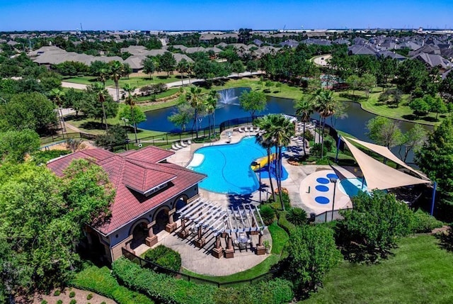 drone / aerial view with a water view