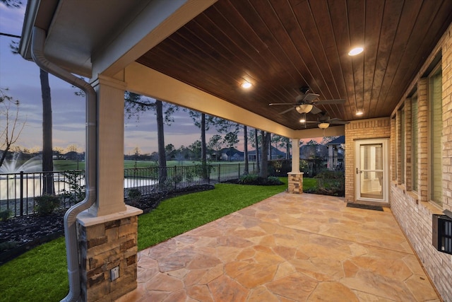 view of patio featuring a fenced backyard and ceiling fan