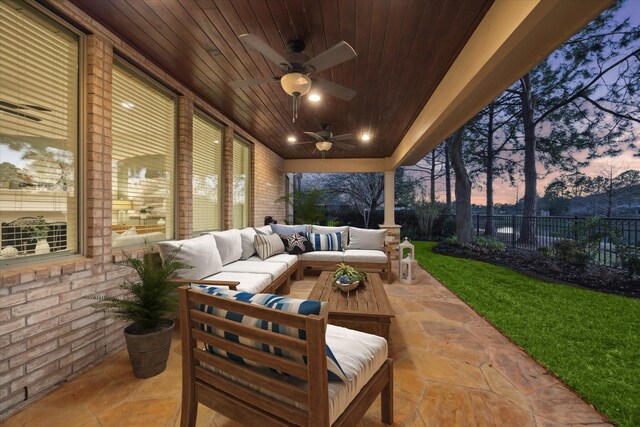 view of patio / terrace featuring an outdoor living space, a ceiling fan, and a fenced backyard