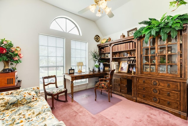 office featuring lofted ceiling, a ceiling fan, and carpet flooring