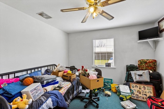 bedroom featuring a ceiling fan, carpet, and visible vents