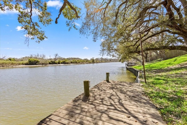 view of dock with a water view