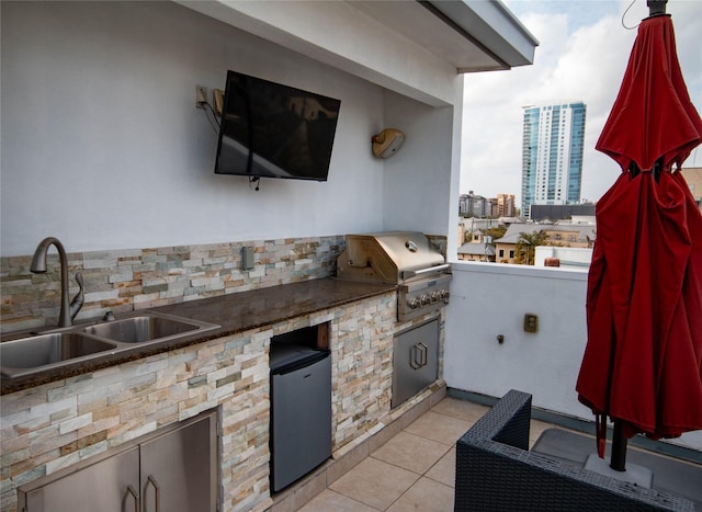 view of patio / terrace with a sink, grilling area, and area for grilling