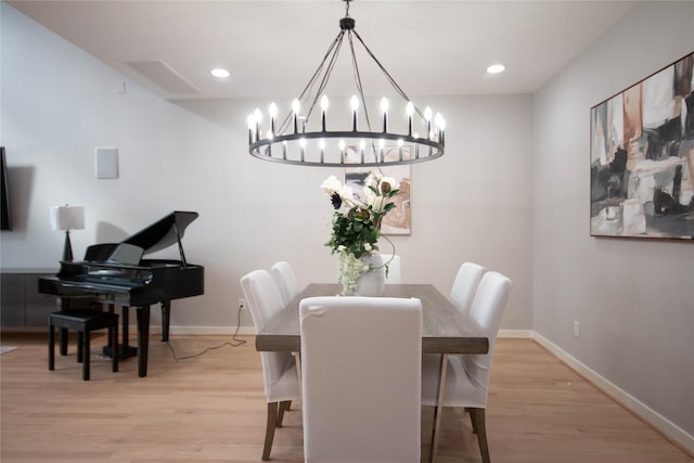 dining area featuring recessed lighting, baseboards, and light wood-style floors