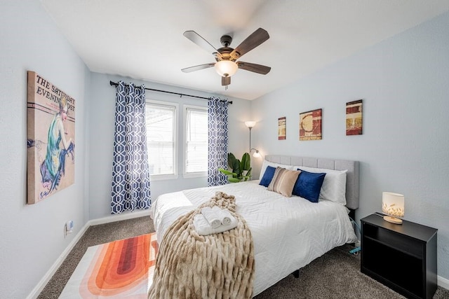 carpeted bedroom featuring ceiling fan and baseboards