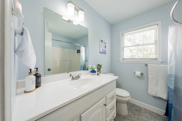 bathroom featuring visible vents, toilet, a shower with shower curtain, vanity, and baseboards