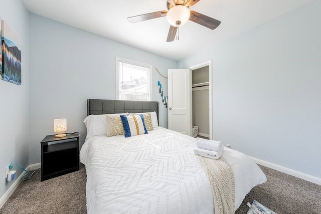 bedroom with a ceiling fan, carpet, a closet, and baseboards