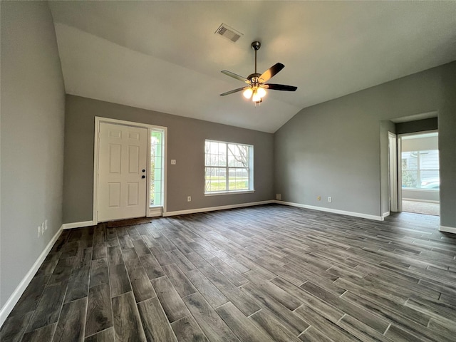 entrance foyer with dark wood-style floors, lofted ceiling, visible vents, ceiling fan, and baseboards