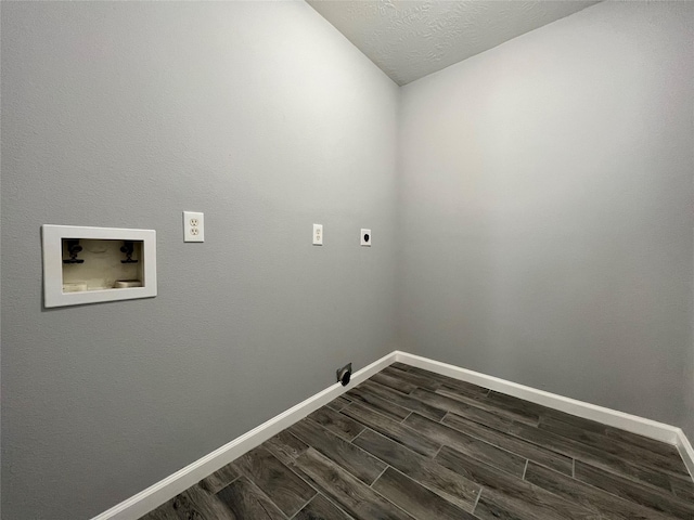 laundry area with washer hookup, wood tiled floor, electric dryer hookup, laundry area, and baseboards