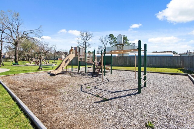 community play area with a yard