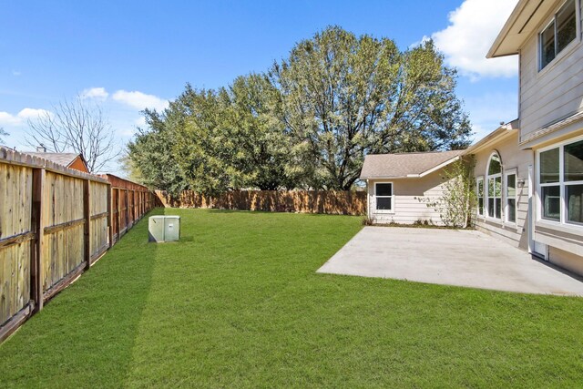 view of yard featuring a fenced backyard and a patio