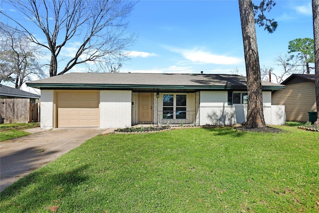 view of front of house featuring driveway, fence, an attached garage, a front yard, and brick siding