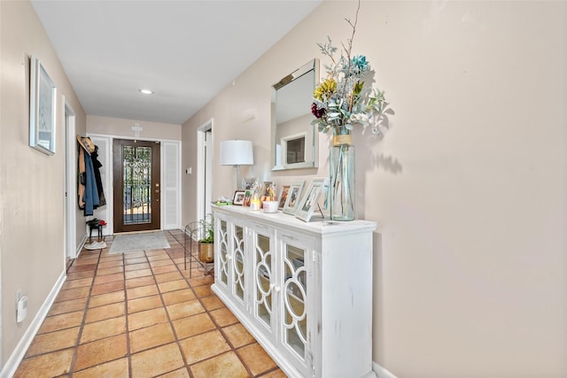 entrance foyer featuring recessed lighting and baseboards