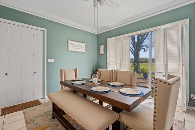 2526 Country Club Blvd, Sugar Land, TX 77478 - dining space featuring light tile patterned flooring, ceiling fan, and crown molding