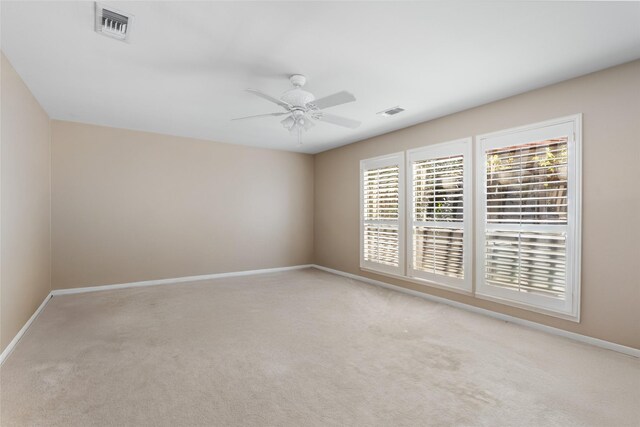 2526 Country Club Blvd, Sugar Land, TX 77478 - unfurnished room with carpet flooring, baseboards, and ceiling fan