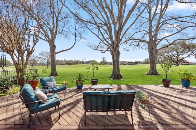 deck featuring a lawn