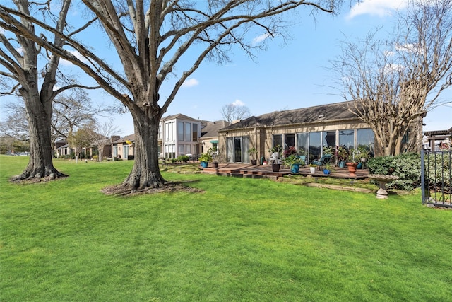 view of yard with a deck