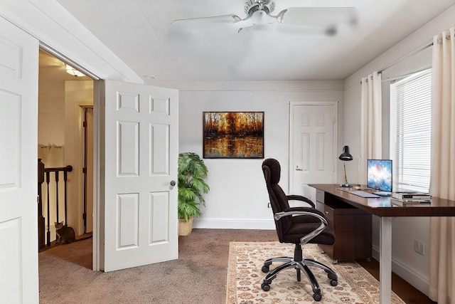 home office featuring baseboards and carpet flooring