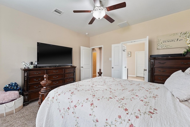 bedroom with visible vents, a ceiling fan, and carpet floors