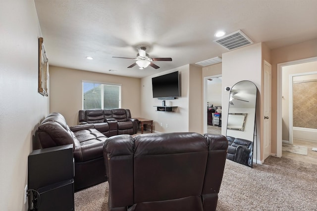 carpeted living area with recessed lighting, baseboards, visible vents, and ceiling fan