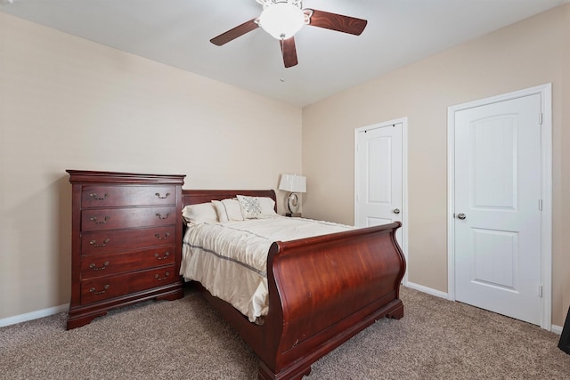 bedroom featuring carpet, baseboards, and ceiling fan