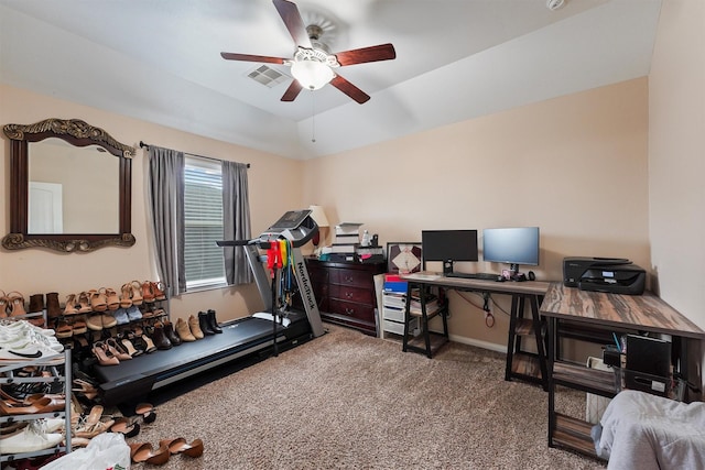 office area featuring visible vents, baseboards, carpet, lofted ceiling, and ceiling fan