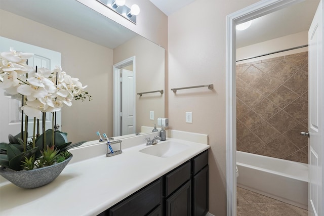 bathroom with toilet, a sink, tile patterned flooring, double vanity, and shower / bath combination