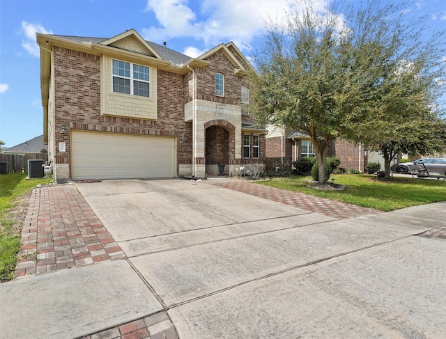 view of front of house with concrete driveway, a front lawn, a garage, stone siding, and brick siding