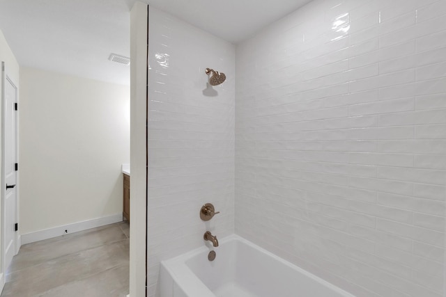 full bath featuring visible vents, shower / washtub combination, vanity, and baseboards