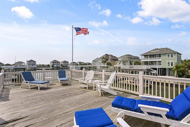wooden deck featuring a residential view
