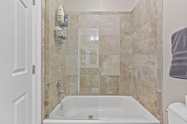 bathroom featuring toilet and shower / bath combination