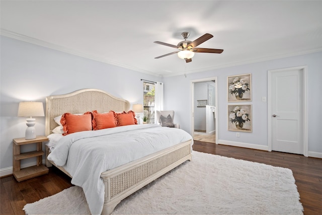 bedroom with ornamental molding, ceiling fan, baseboards, and wood finished floors