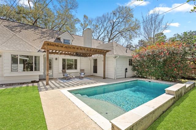 pool with a patio, a pergola, a yard, and fence