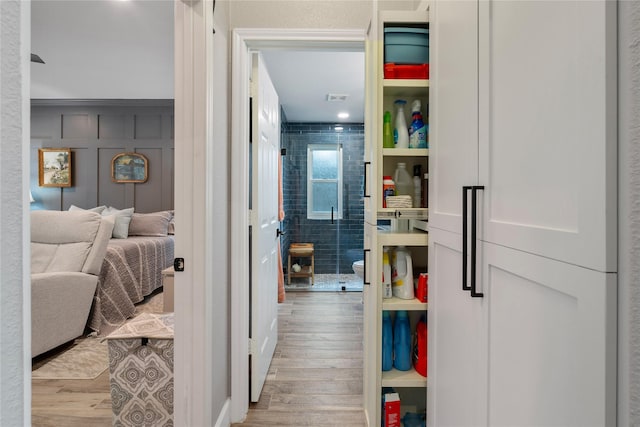 hall featuring wood finished floors