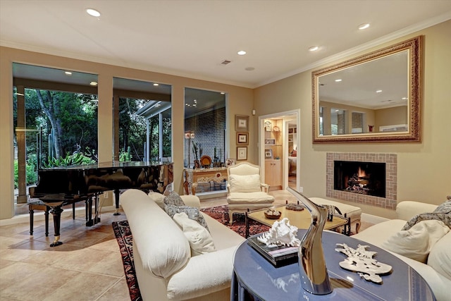 living room featuring light tile patterned floors, ornamental molding, a fireplace, and recessed lighting