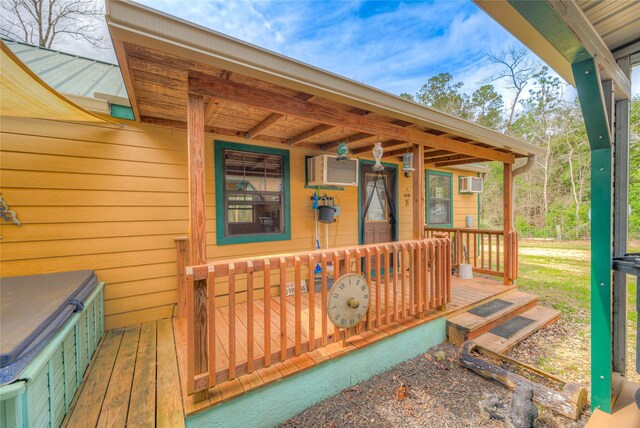 wooden deck featuring covered porch