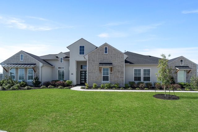 view of front facade with stone siding, stucco siding, and a front lawn